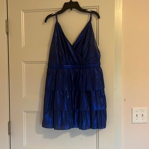 This is a mini ruffle dress in a cute royal blue.